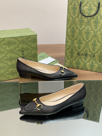 ua G*u*i women's horsebit ballet flat