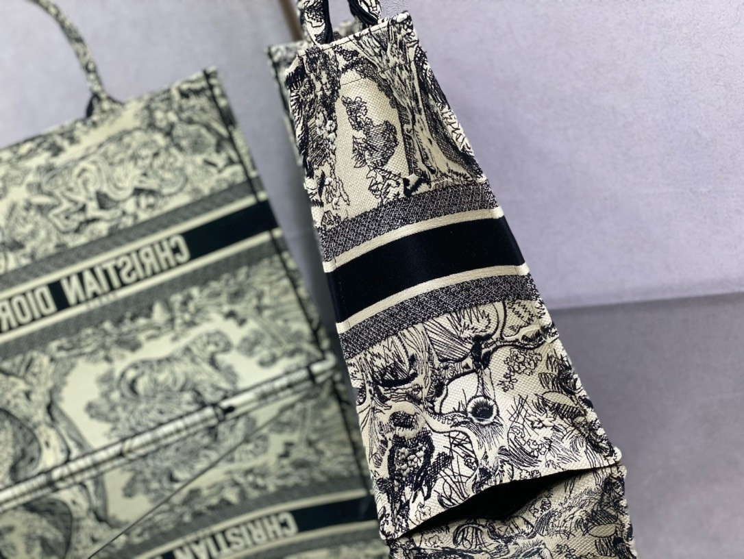 large D*or book tote ecru and blue toile de jouy embroidery 16.5 x 14 x 7.5 inches