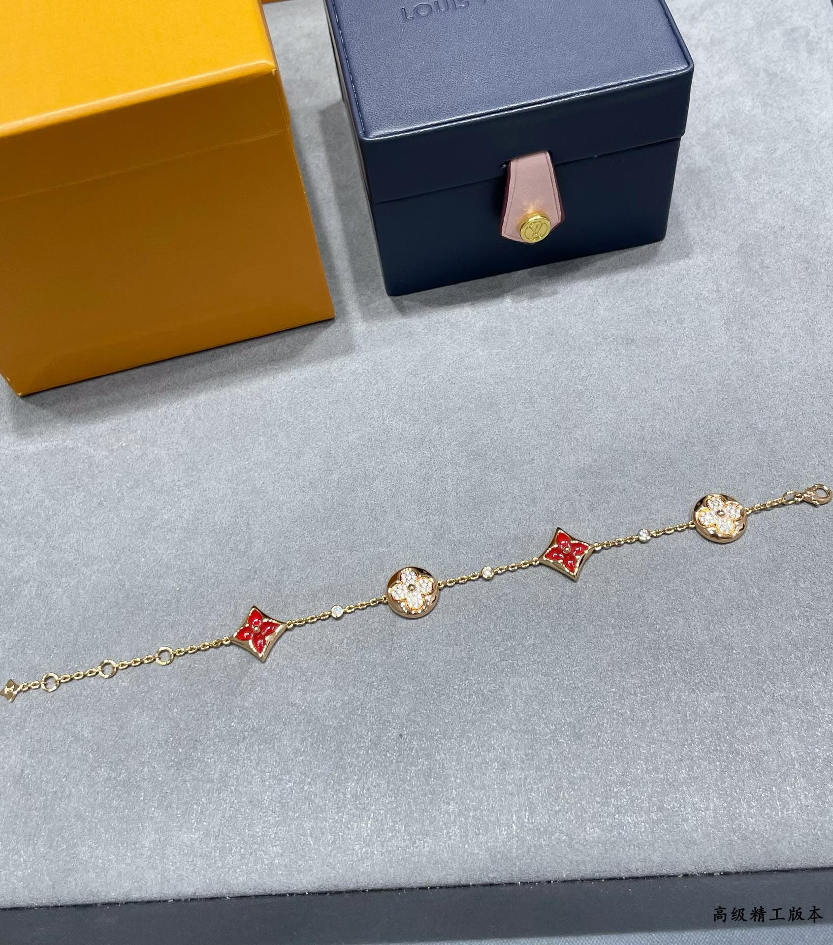 l0*is vuitto large with red agate and Di*m*nds four-flower bracelet