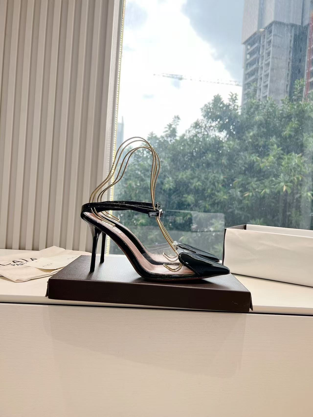 UA ALAÏA Patent Heart-Toe Stiletto Pumps