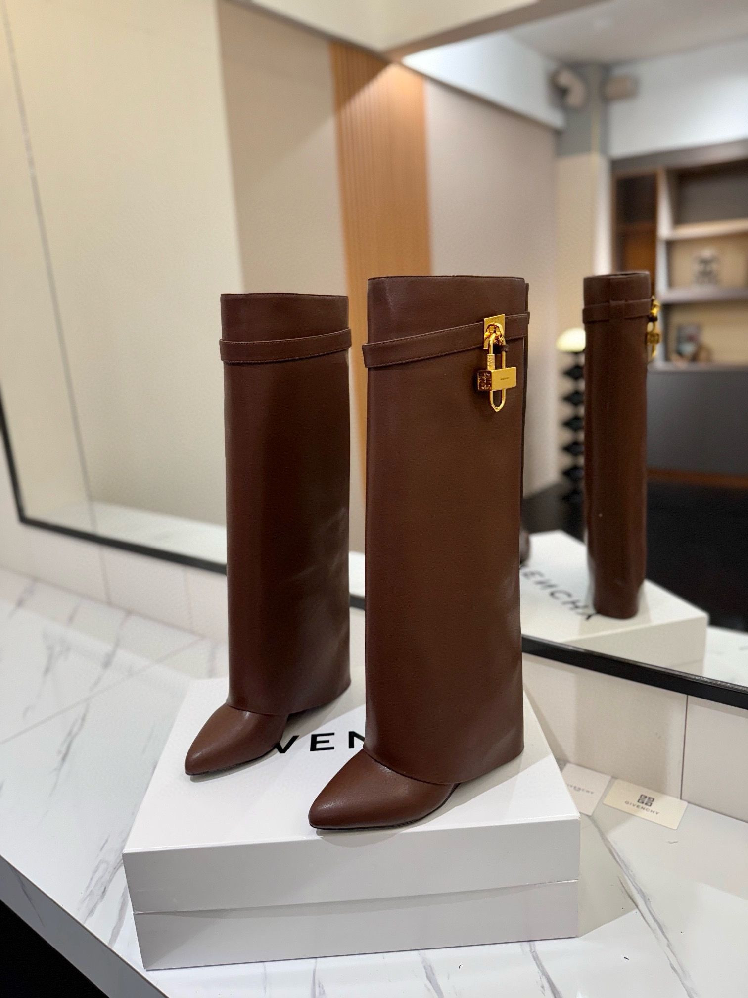 UA Givenchy Shark Lock boots in leather