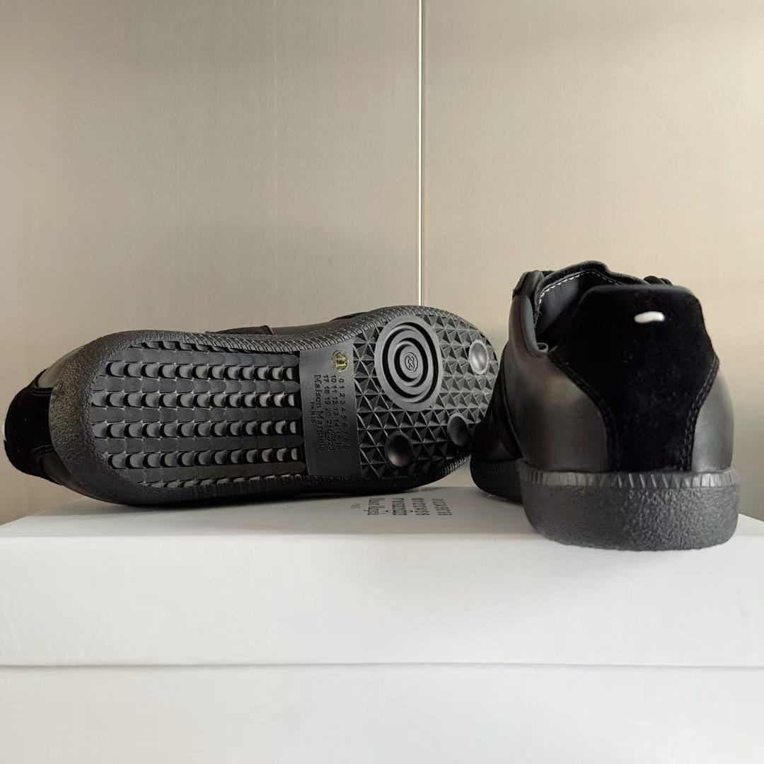 ua ma*s*n Ma*i*la mm6 sneakers