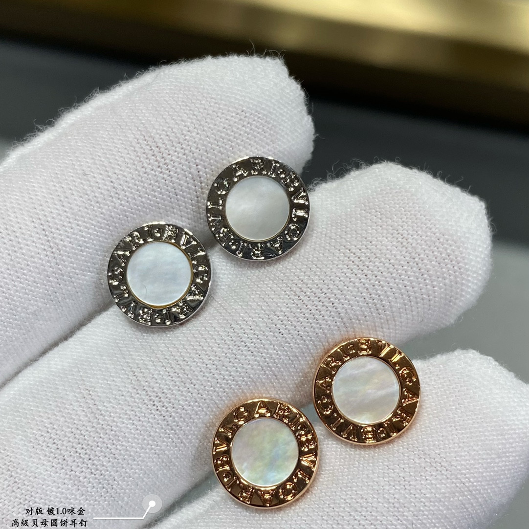 B*l*ai round cake earrings
