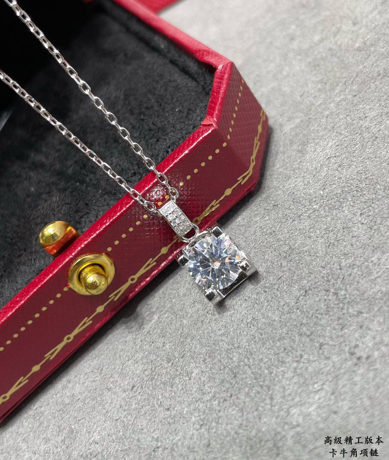 Ca*t*er horn necklace