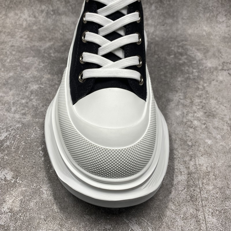 ale*d*r M*Q*en tread slick high lace up boot black white