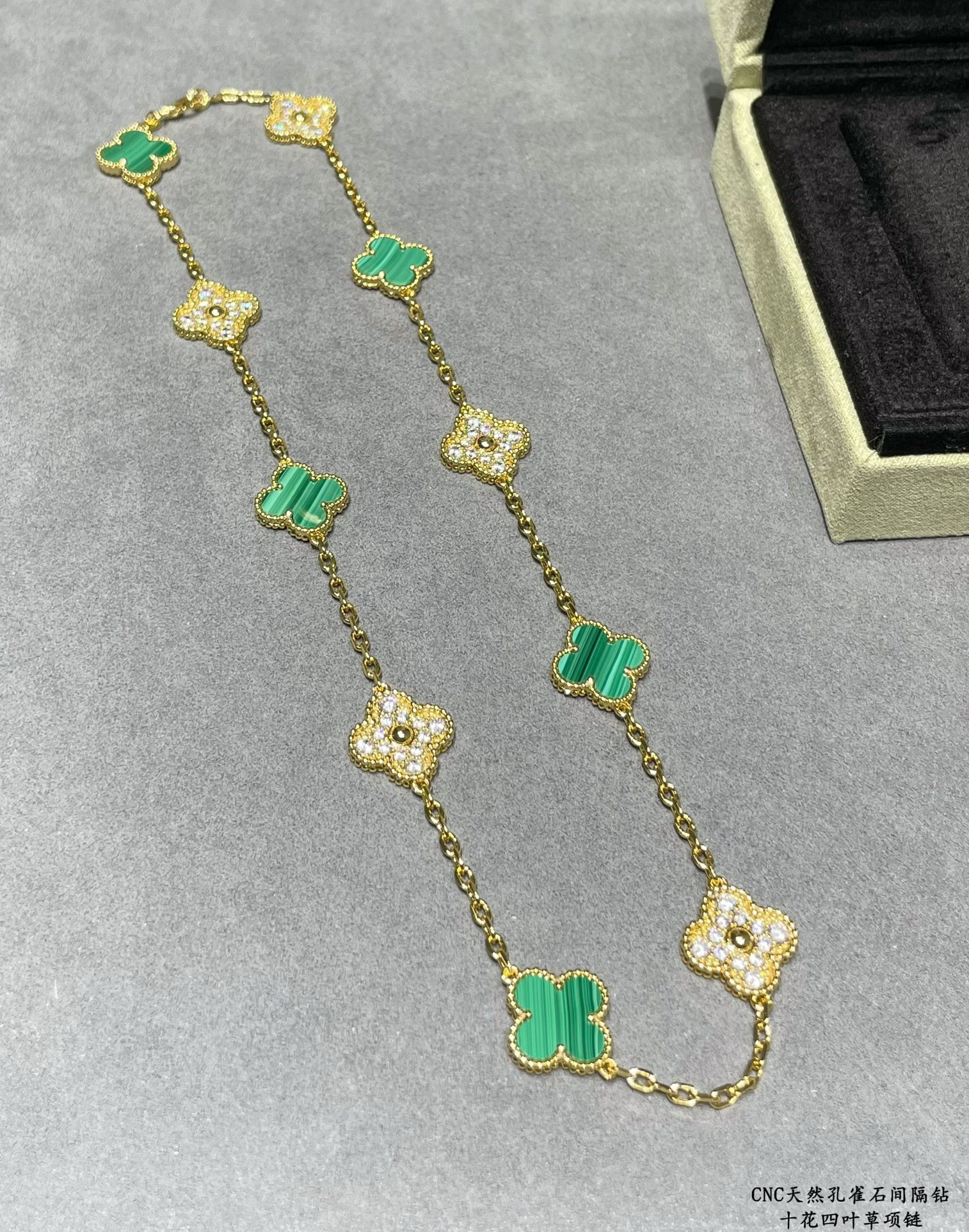 v*n cl*f & arpels natural malachite interval Di*m*nd ten flower four leaf clover necklace