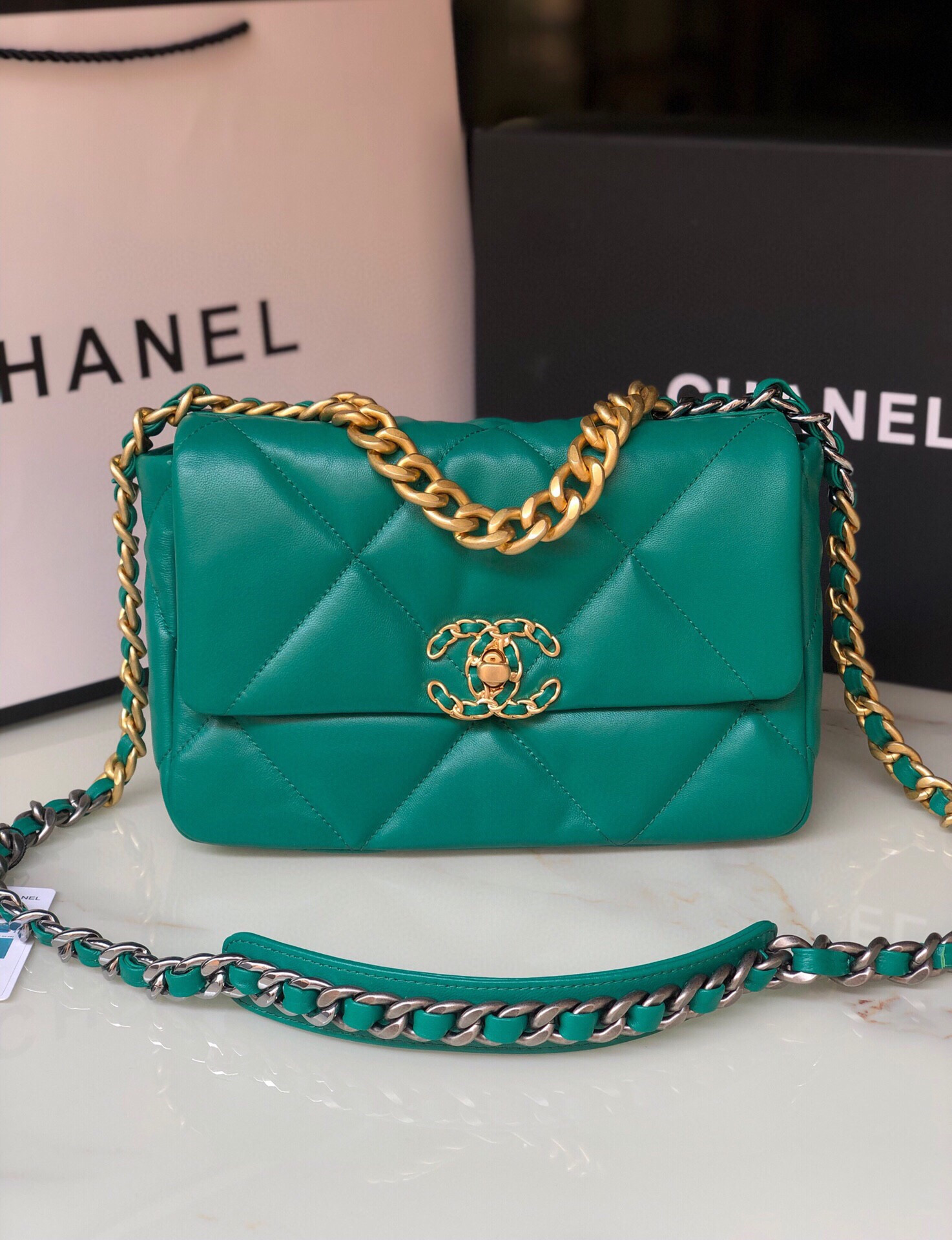 Ch*el 19 handbag shiny leather, gold-tone, silver-tone & ruthenium-finish metal green 6.2 × 10.1 × 3.5 in