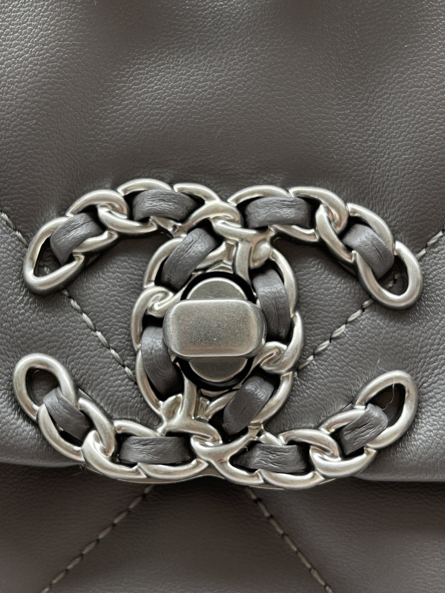 Ch*el 19 large handbag shiny leather, gold-tone, silver-tone & ruthenium-finish metal gray 7.8 × 11.7 × 3.9 in