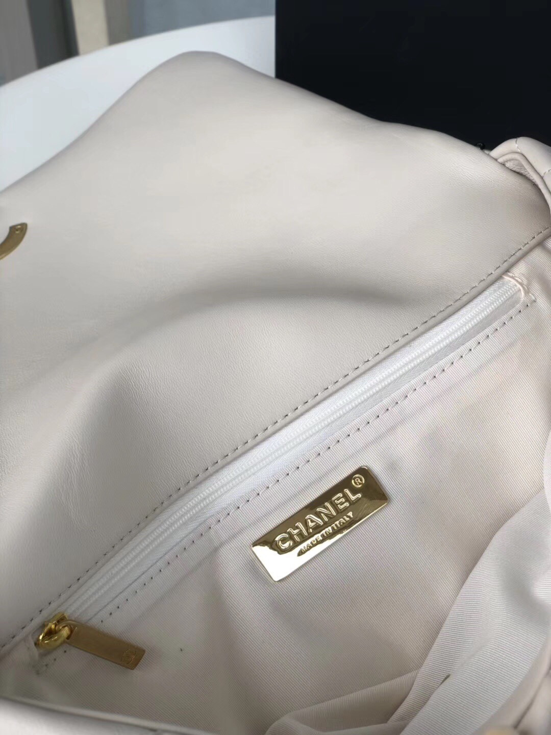 Ch*el 19 large handbag shiny leather, gold-tone, silver-tone & ruthenium-finish metal beige 7.8 × 11.7 × 3.9 in