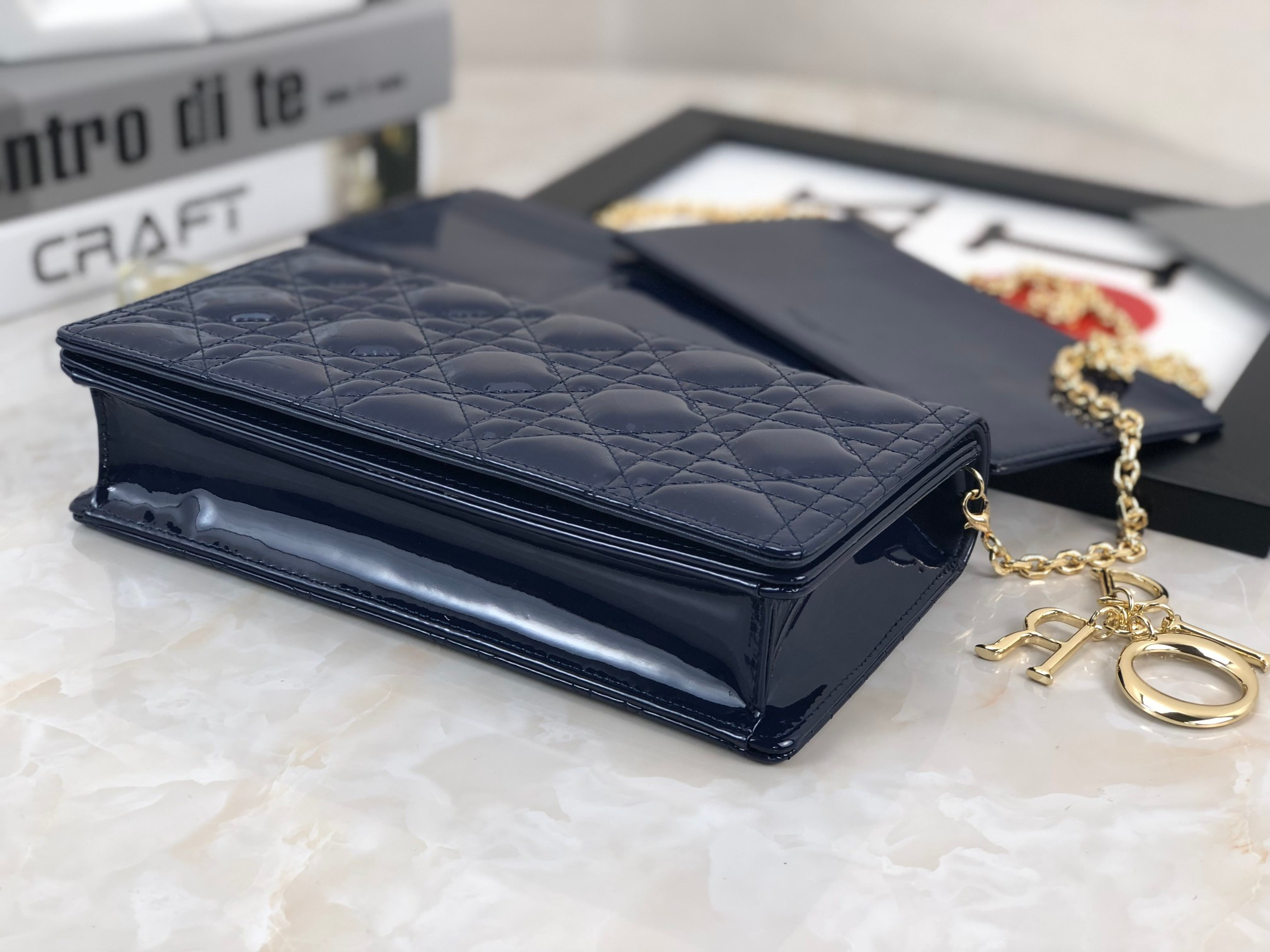 lady D*or pouch  navy patent cannage calfskin 8.5 x 4.5 x 1 inches