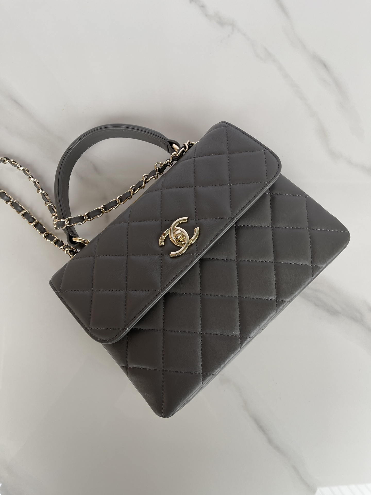 Ch*el flap bag with top handle 6.6 × 9.8 × 4.7 in