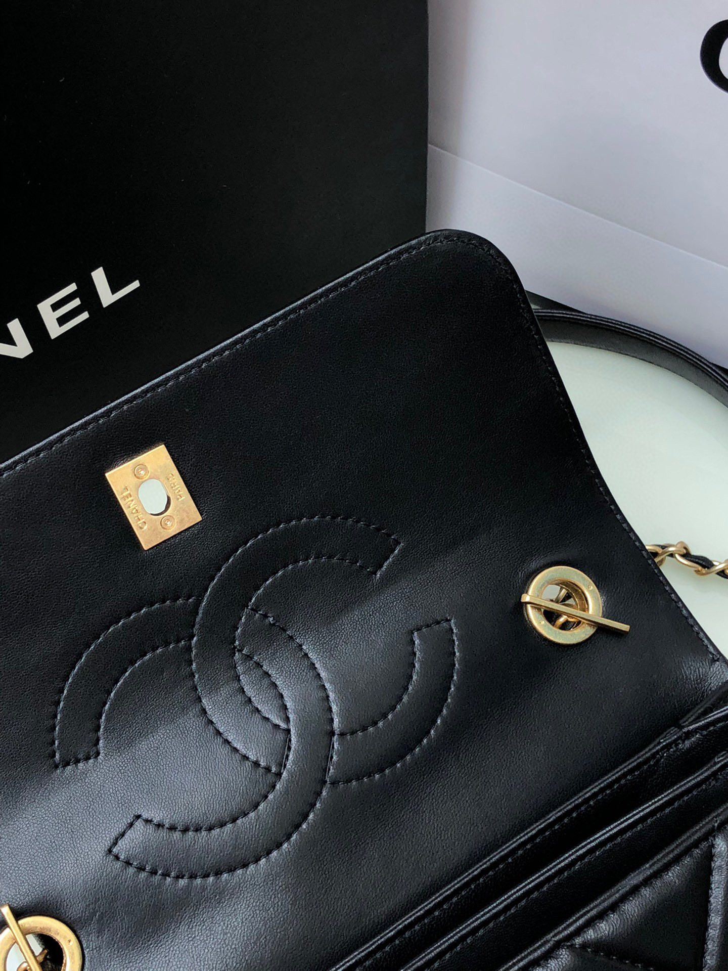 Ch*el flap bag with top handle 6.6 × 9.8 × 4.7 in