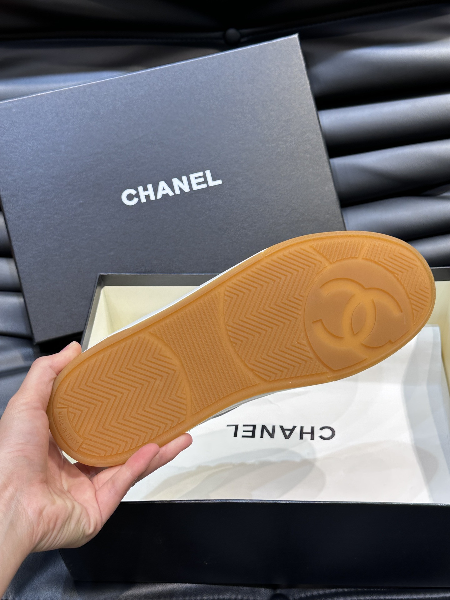ua Ch*el sneaker calfskin