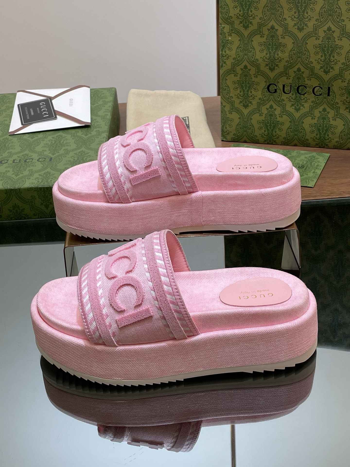 ua G*u*i slide sandal with G*u*i script
