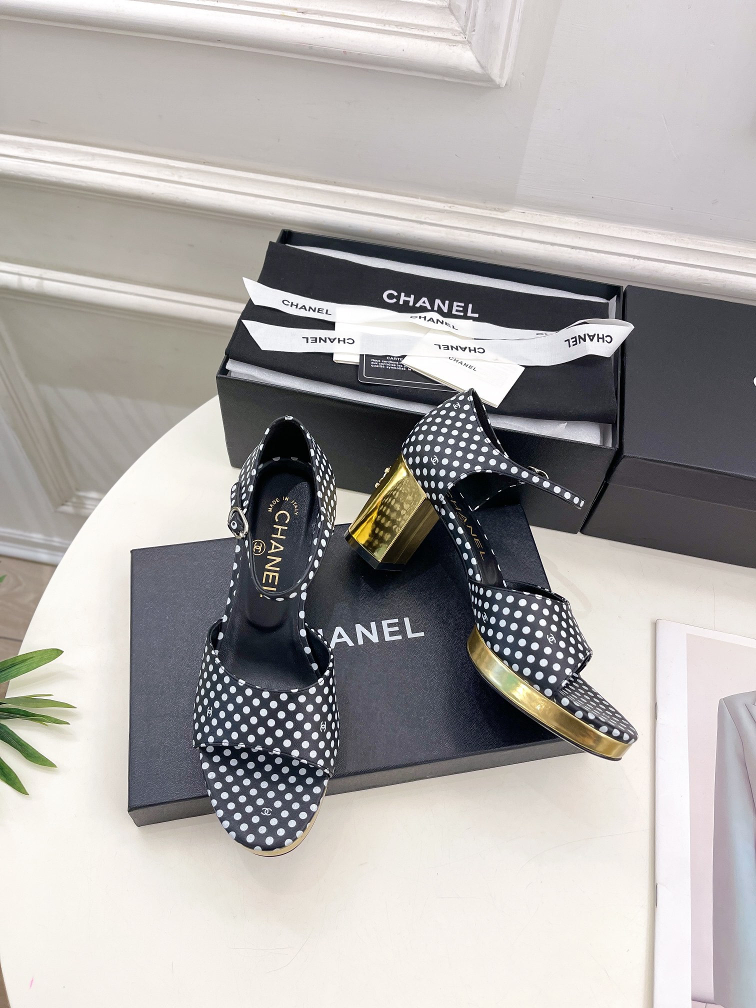 ua Ch*el heeled sandals