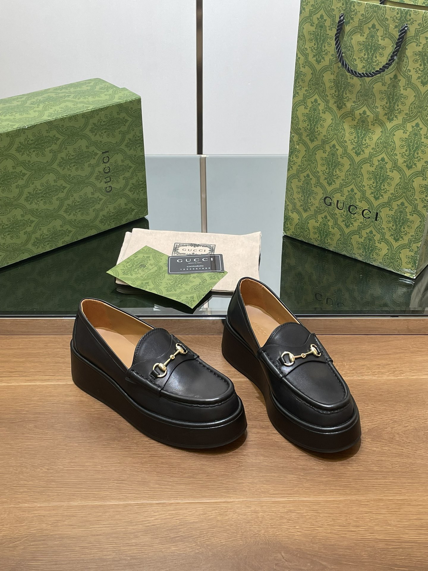 ua G*u*i horsebit wedge loafer