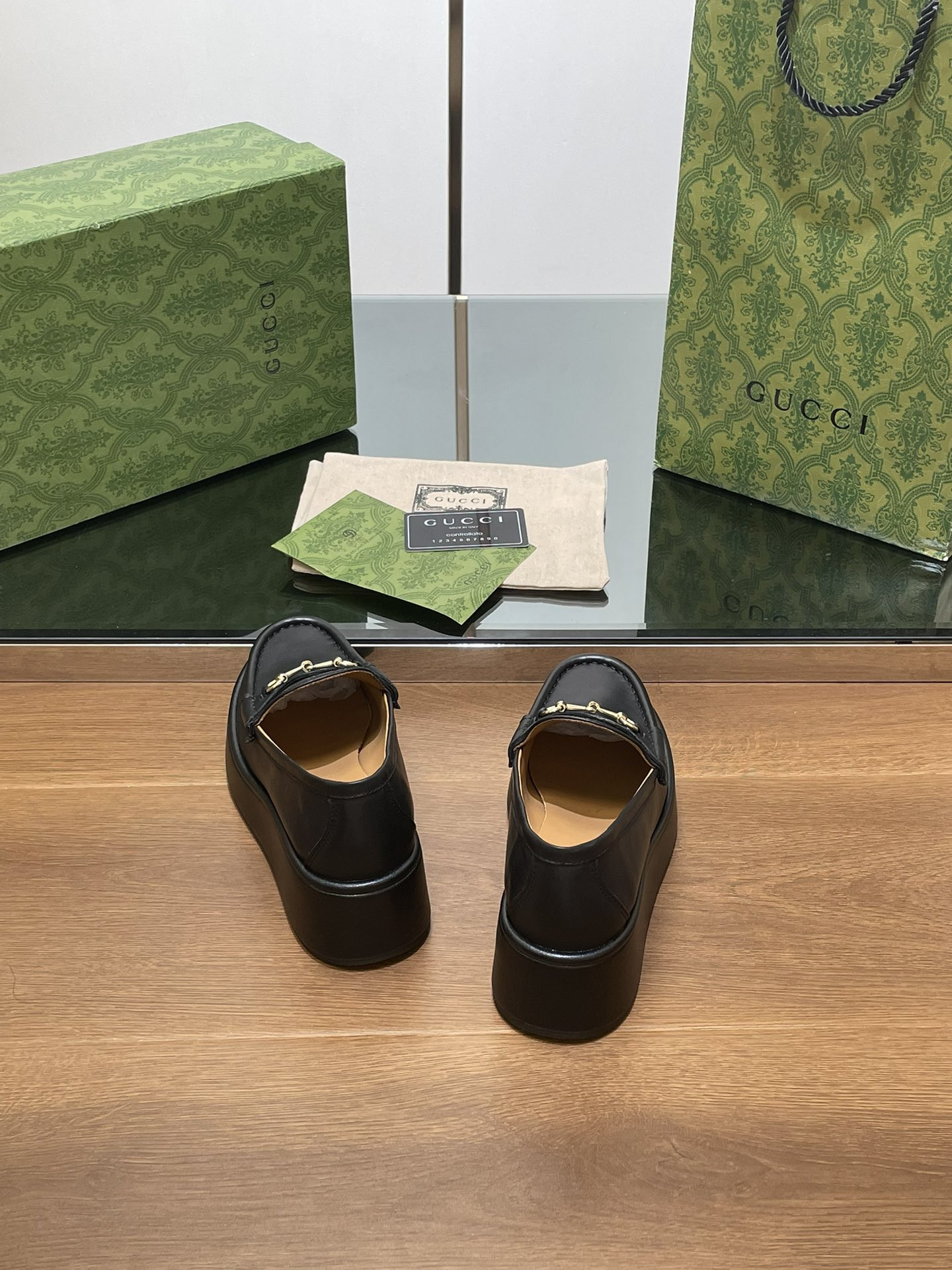 ua G*u*i horsebit wedge loafer
