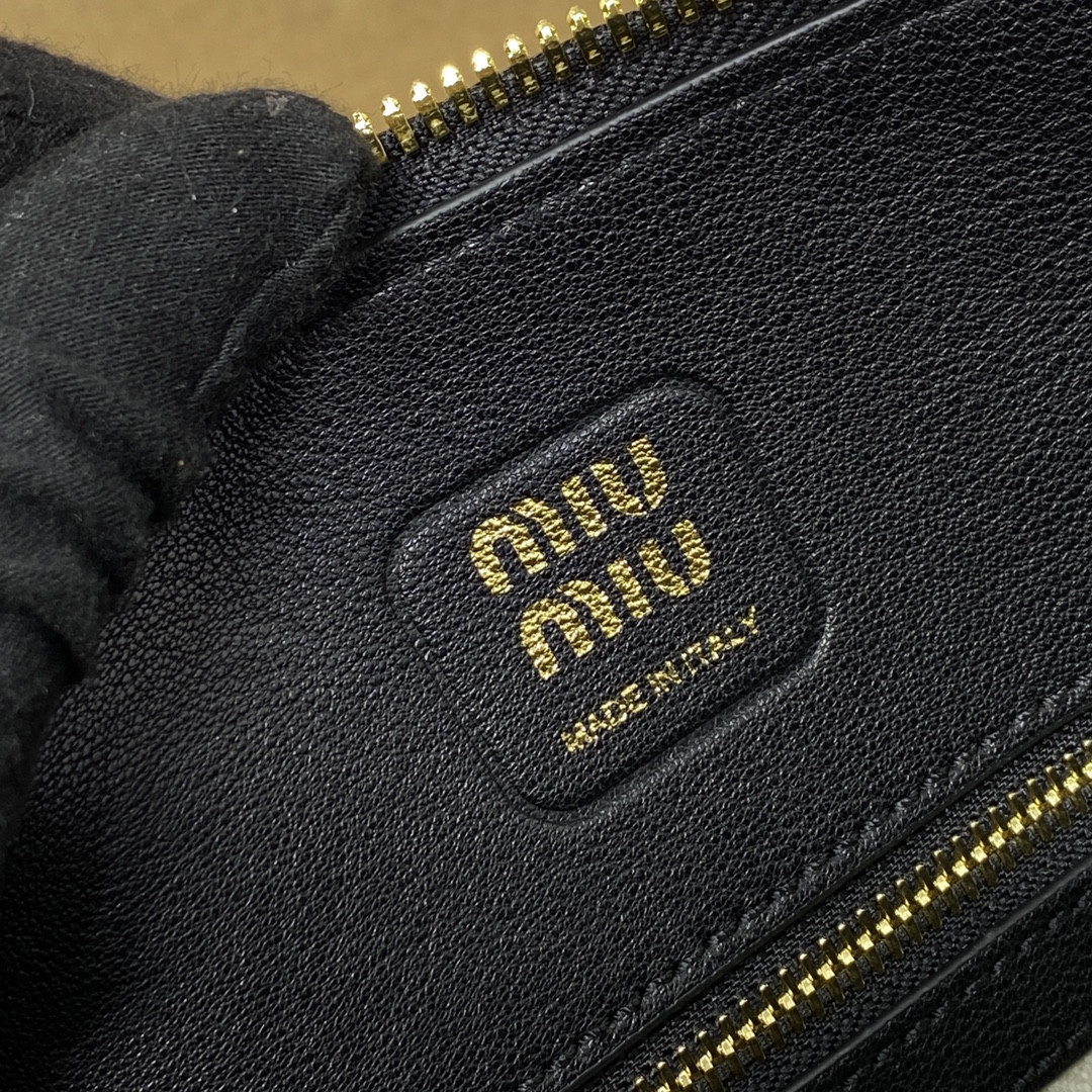 Miu Miu Aventure nappa leather top-handle bag 17x33x11cm