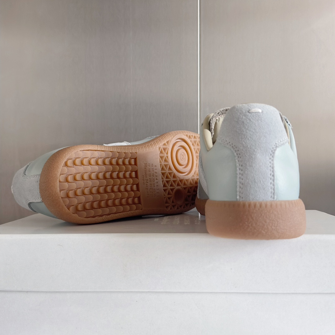 ua ma*s*n Ma*i*la mm6 sneakers